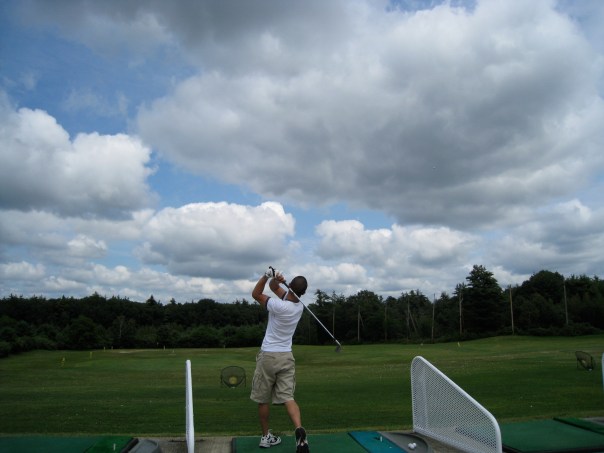 2:00 p.m. - At the driving range, doing the world's worst Tiger Woods impression.